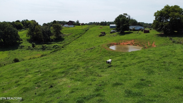 exterior space with a rural view