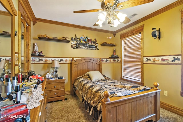 carpeted bedroom with ceiling fan and ornamental molding