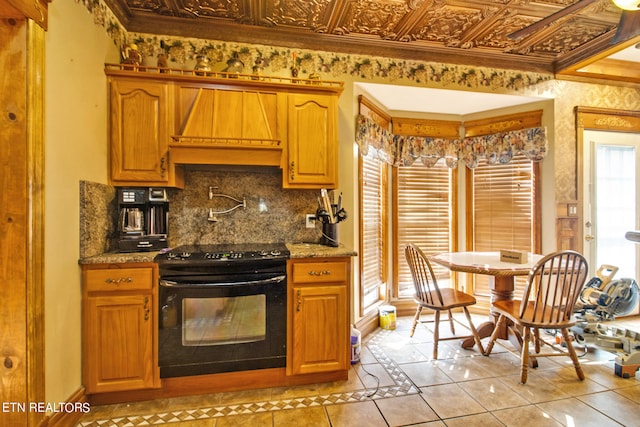 kitchen with tasteful backsplash, crown molding, custom range hood, black / electric stove, and light tile patterned floors