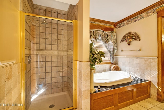 bathroom with independent shower and bath, tile patterned flooring, toilet, and tile walls