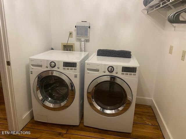 laundry area featuring dark hardwood / wood-style floors and independent washer and dryer