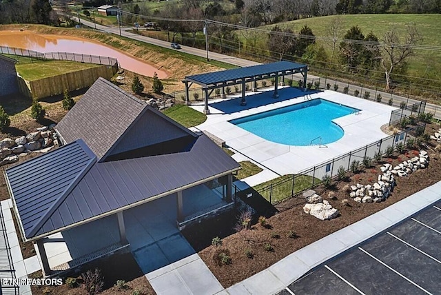 view of swimming pool featuring a patio