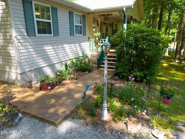 entrance to property with covered porch