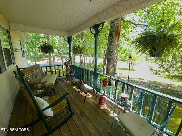 deck with covered porch