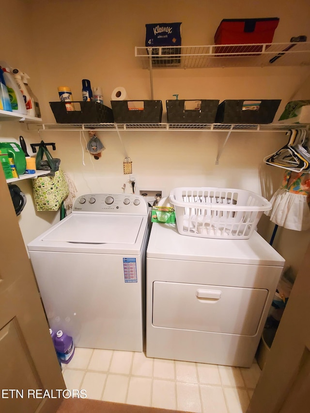 laundry room featuring washer and clothes dryer