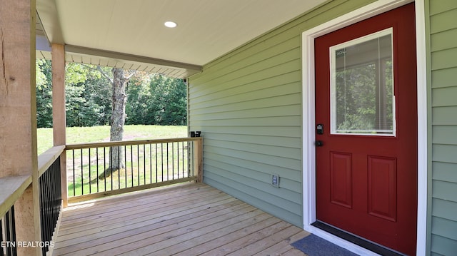 entrance to property with covered porch