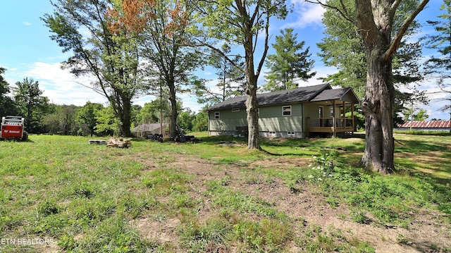 view of yard with a deck