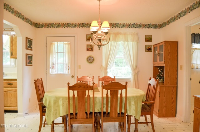 dining room featuring an inviting chandelier