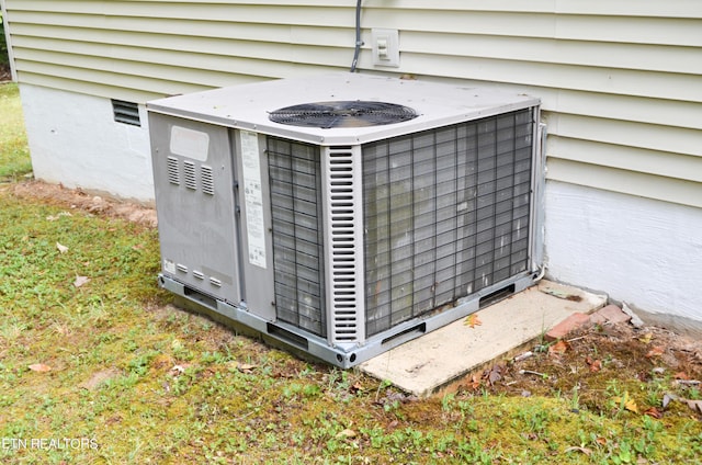 exterior details featuring cooling unit