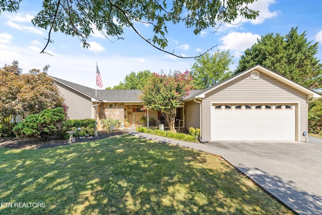 ranch-style home with a front lawn and a garage