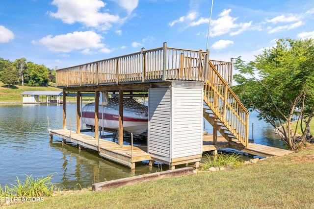 dock area with a water view