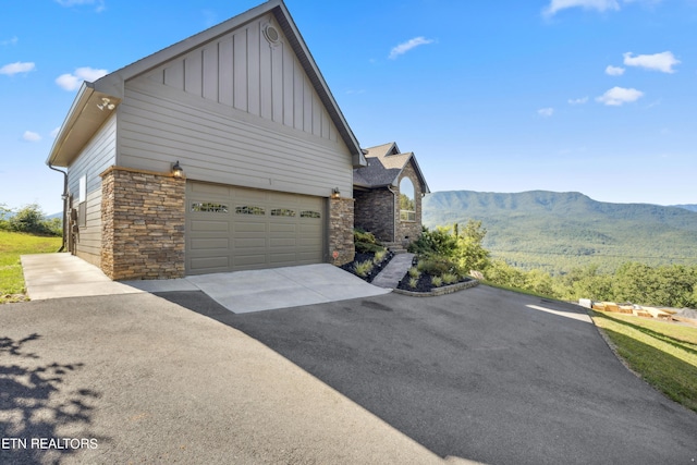 view of home's exterior with a mountain view