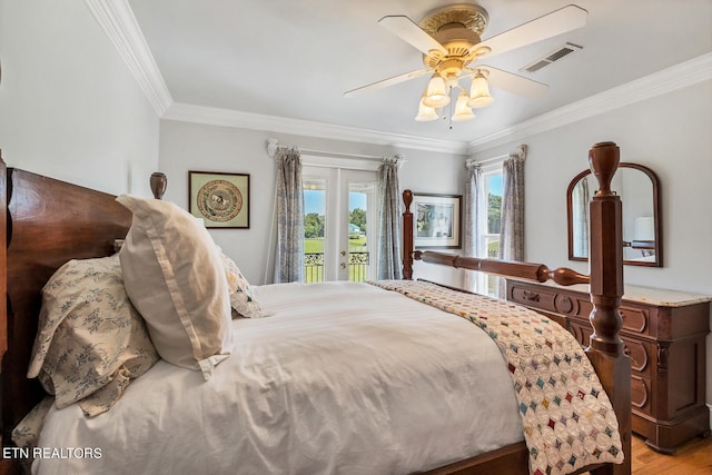 bedroom featuring access to exterior, french doors, light wood-type flooring, ceiling fan, and ornamental molding