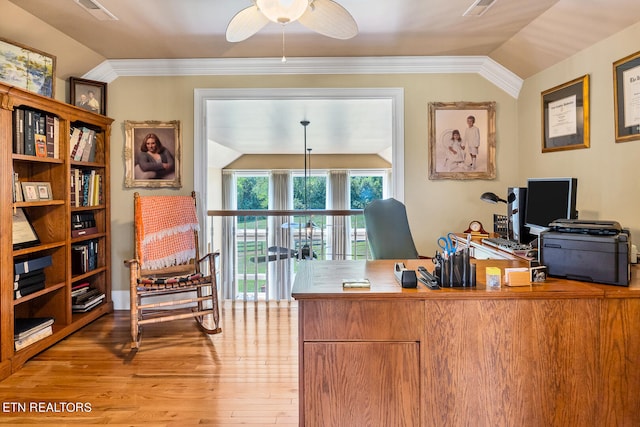 office area featuring light hardwood / wood-style flooring, crown molding, vaulted ceiling, and ceiling fan