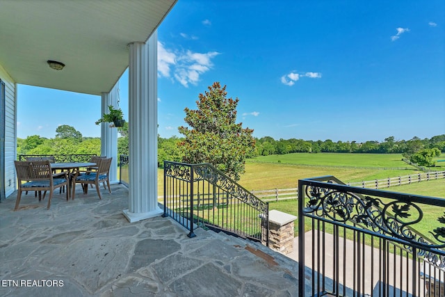 view of patio with a balcony