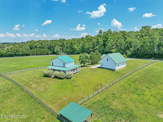 birds eye view of property featuring a rural view