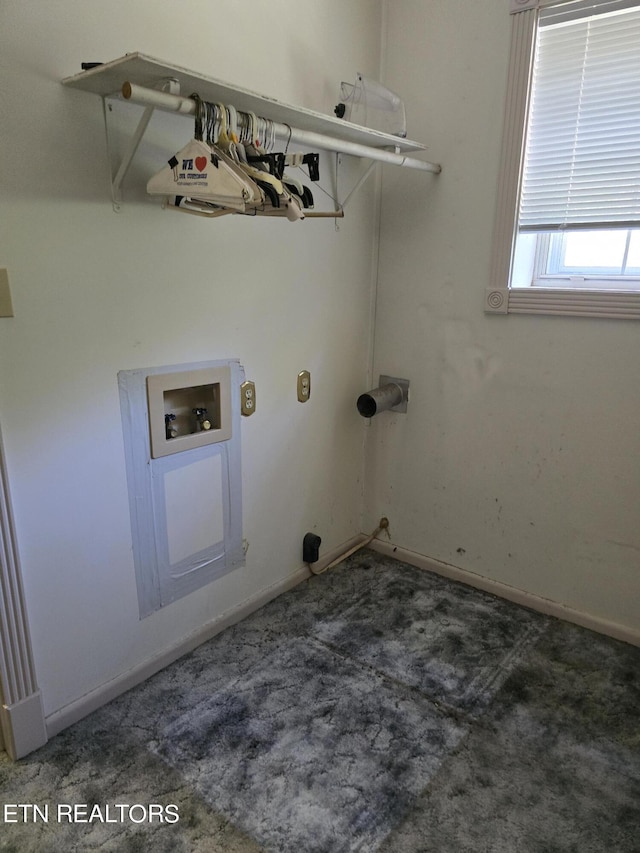 clothes washing area with washer hookup and dark carpet