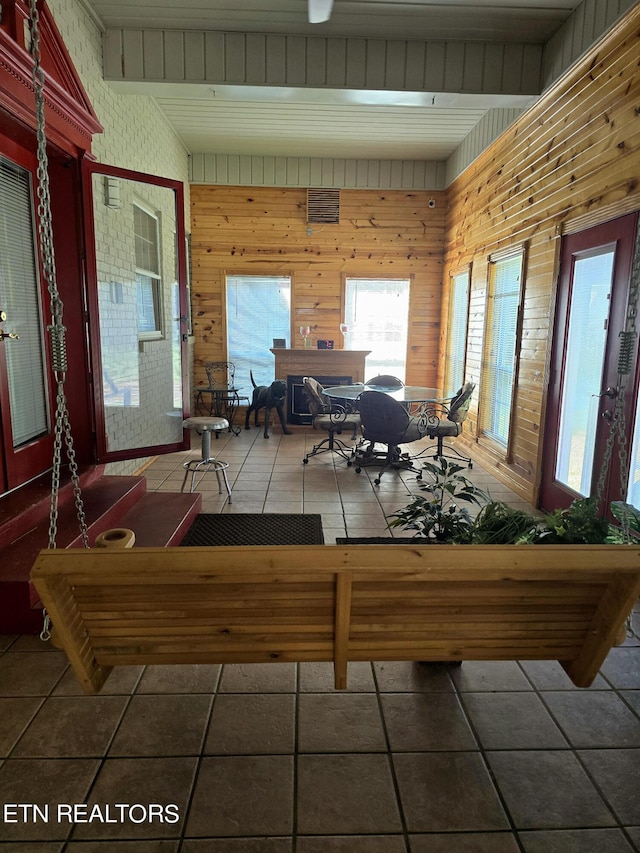 interior space featuring wood walls