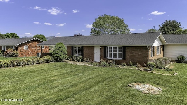 ranch-style house with a front yard