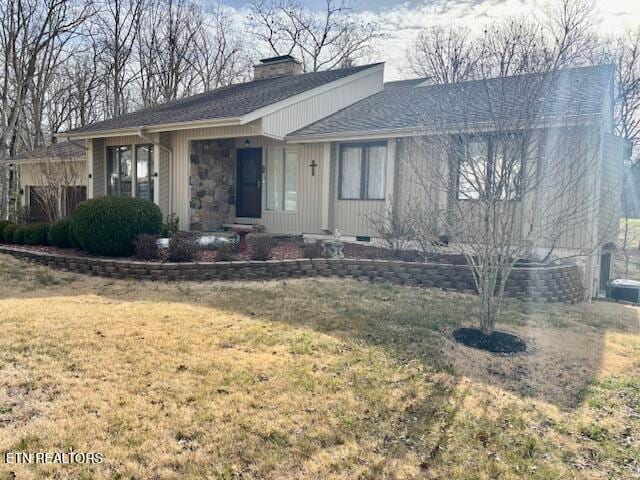 175 Snead Dr, Crossville, TN 38558 - ranch-style home featuring a front yard, a chimney, and roof with shingles