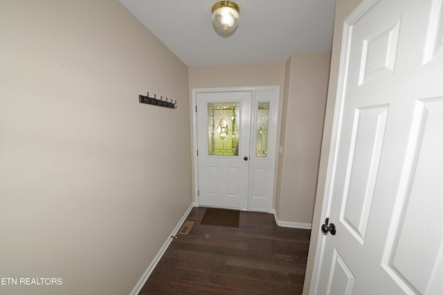 doorway featuring dark hardwood / wood-style flooring