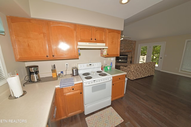 kitchen featuring a brick fireplace, white electric range, and dark hardwood / wood-style flooring