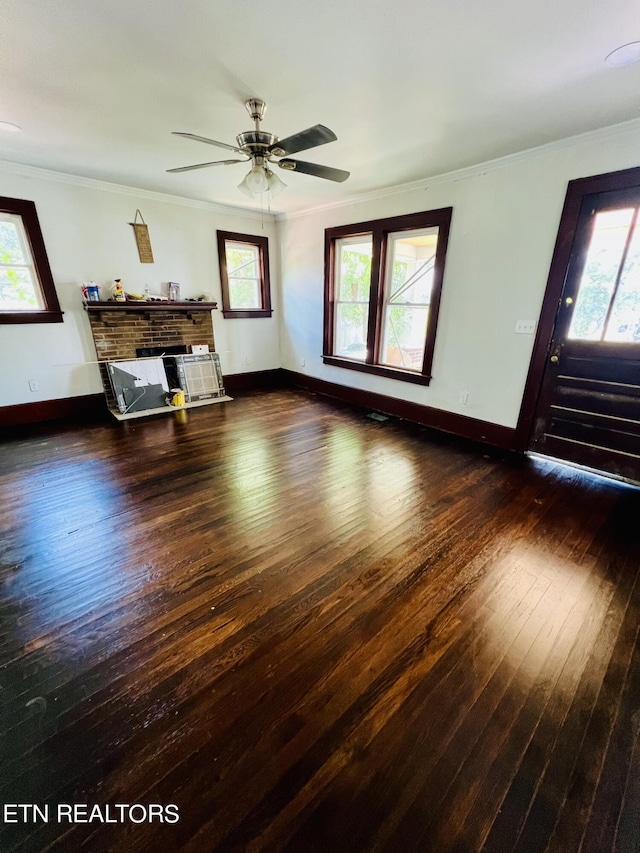 living room with dark hardwood / wood-style floors, ceiling fan, and crown molding