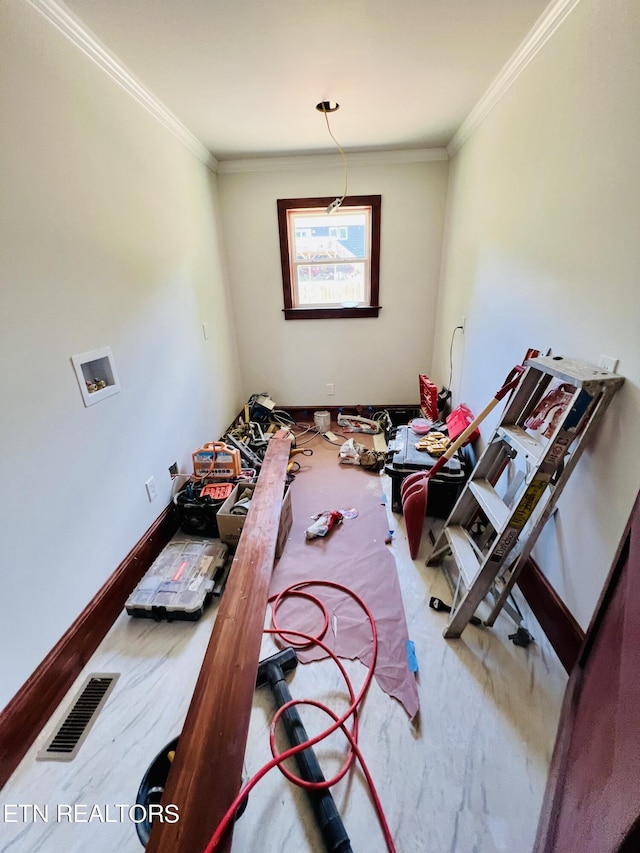 dining area featuring ornamental molding