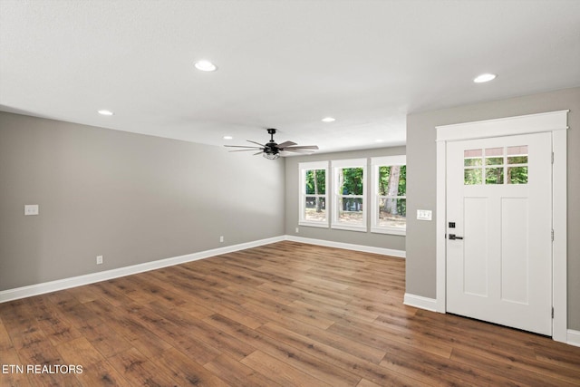 foyer entrance featuring hardwood / wood-style flooring and ceiling fan