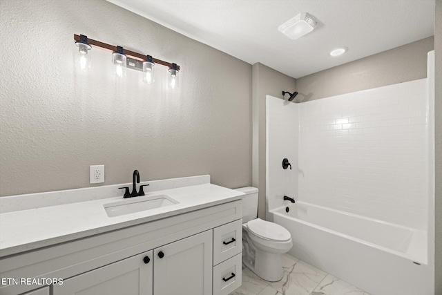 full bathroom featuring toilet, bathtub / shower combination, and vanity