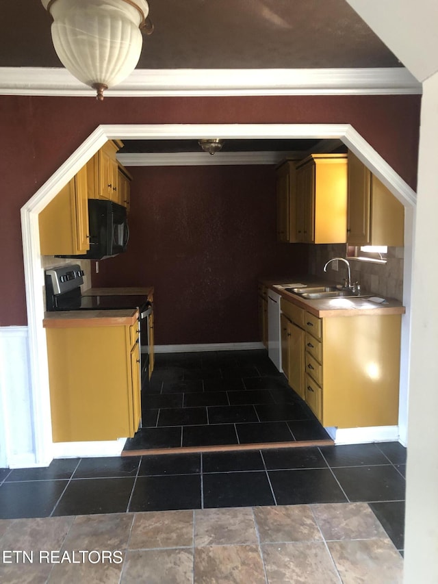 kitchen featuring crown molding, dishwasher, stainless steel range with electric stovetop, and sink