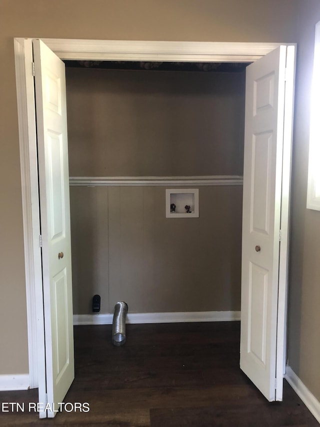 laundry area with washer hookup and dark hardwood / wood-style floors