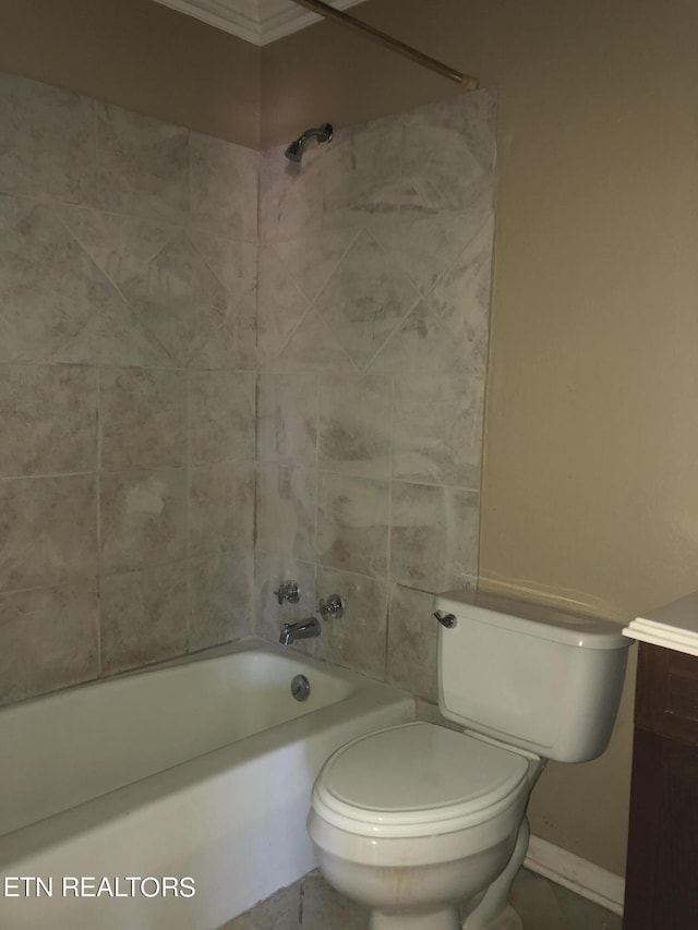 full bathroom featuring vanity, toilet, and tiled shower / bath combo