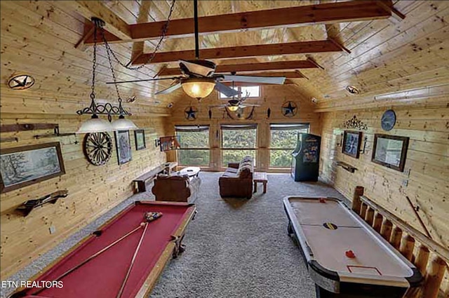 rec room with ceiling fan, dark carpet, pool table, wood walls, and beamed ceiling