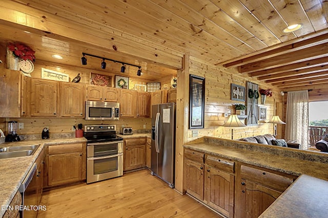 kitchen with light hardwood / wood-style floors, appliances with stainless steel finishes, wooden ceiling, sink, and beam ceiling