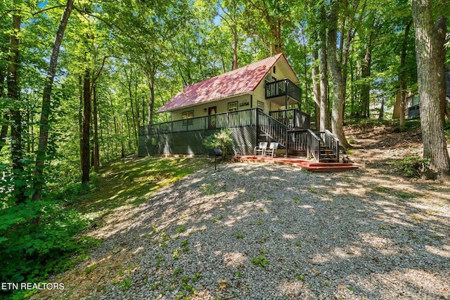 view of yard with a wooden deck