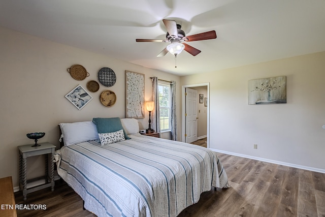 bedroom with wood-type flooring and ceiling fan