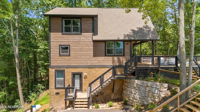 view of front of house featuring a deck