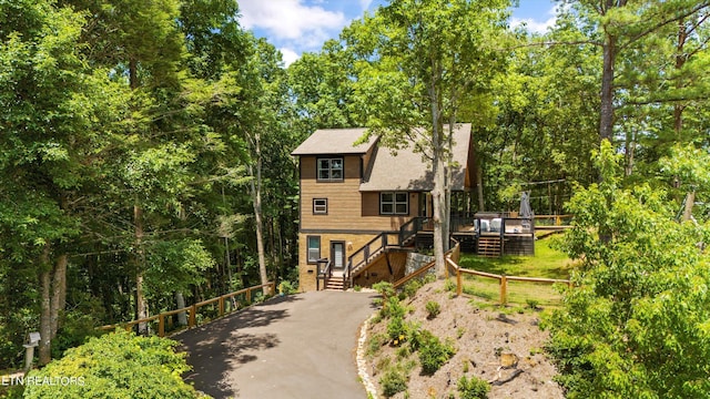 view of front of home featuring a wooden deck