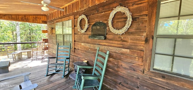 wooden deck with ceiling fan