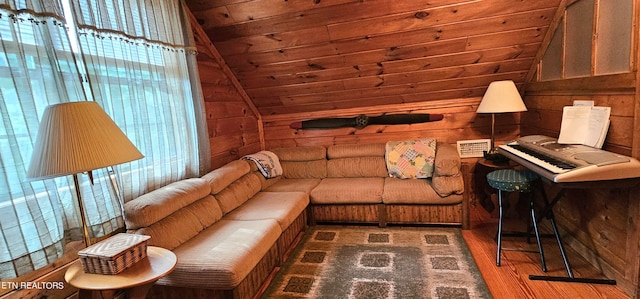 living room with dark wood-type flooring, vaulted ceiling, wood ceiling, and wooden walls