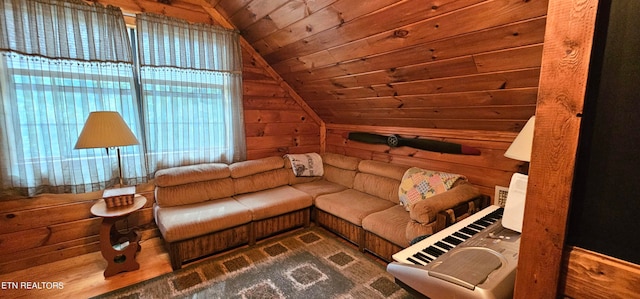 living room featuring wooden ceiling and lofted ceiling