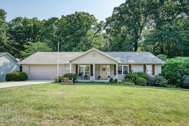 ranch-style home featuring a porch, a garage, and a front yard