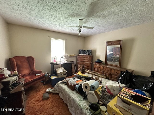 carpeted bedroom with a textured ceiling and ceiling fan