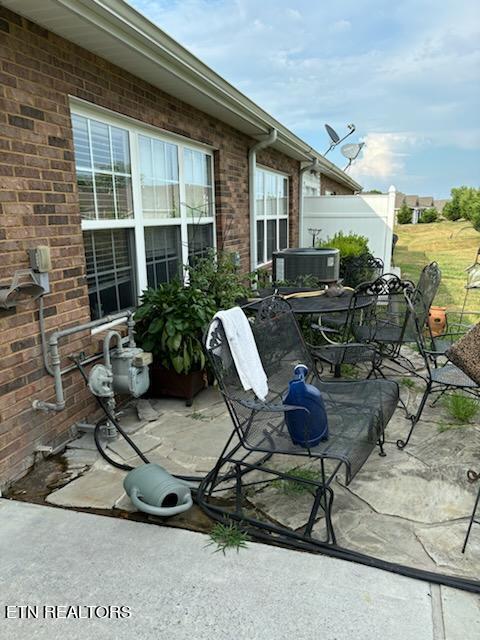 view of patio / terrace featuring cooling unit