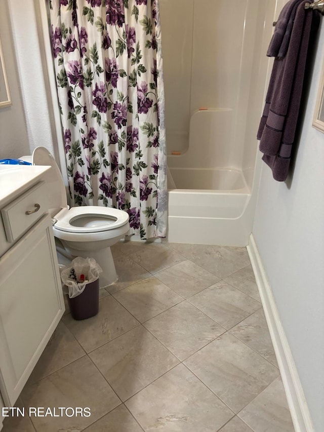 full bathroom featuring vanity, shower / bath combo, tile patterned flooring, and toilet