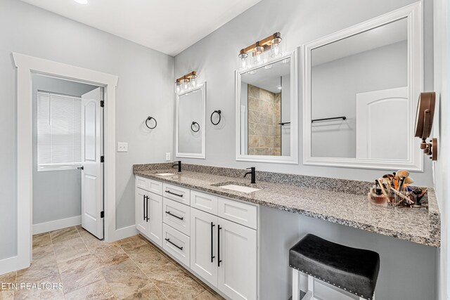 bathroom featuring vanity