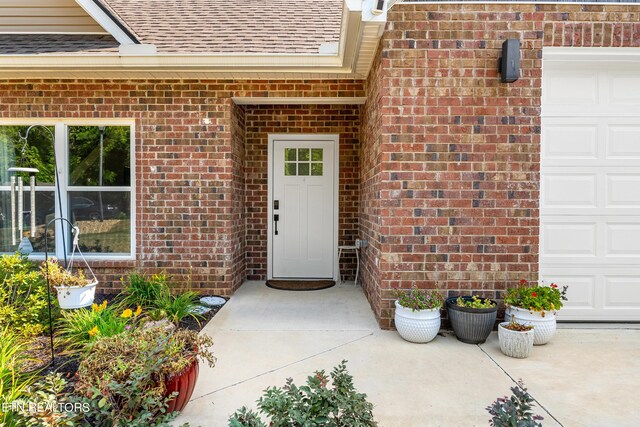 entrance to property with a garage