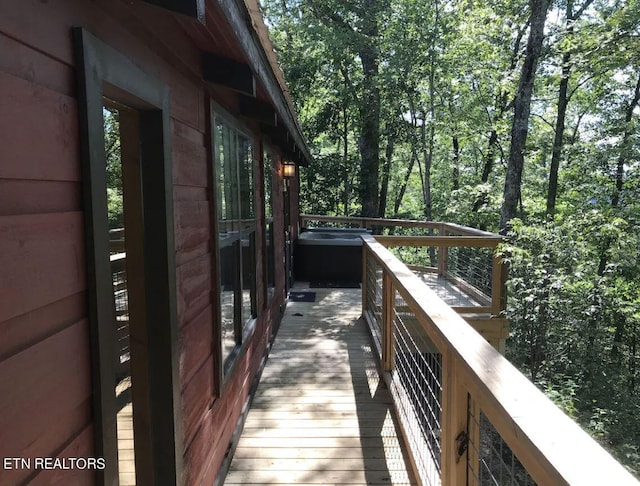 exterior space with a jacuzzi