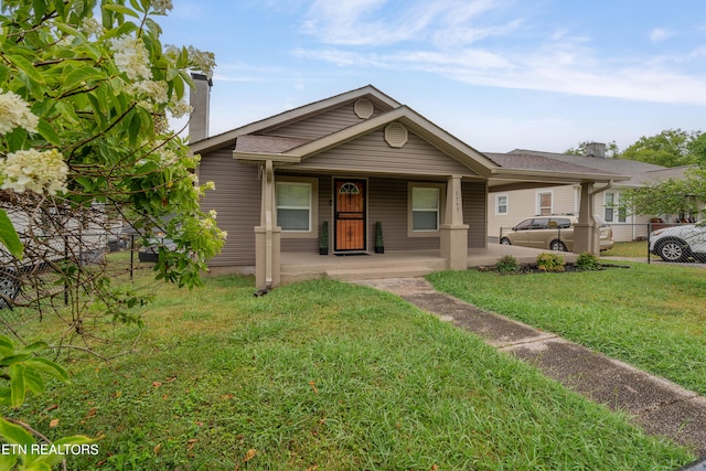 bungalow with a front lawn